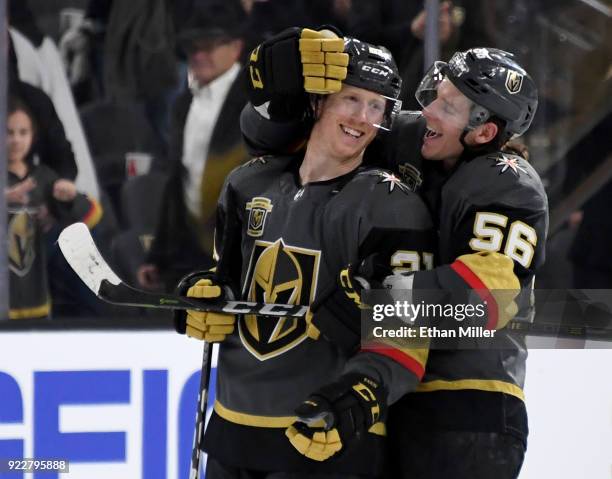 Erik Haula of the Vegas Golden Knights hugs teammate Cody Eakin after their 7-3 victory over the Calgary Flames at T-Mobile Arena on February 21,...