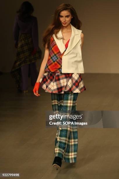 Model walks the runway at the Marta Jakubowski Show during London Fashion Week February 2018 at BFC Show Space.