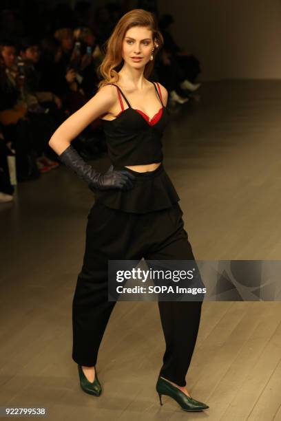 Model walks the runway at the Marta Jakubowski Show during London Fashion Week February 2018 at BFC Show Space.