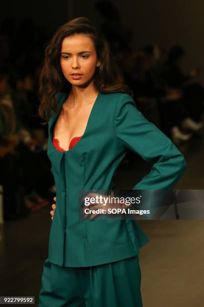 Model walks the runway at the Marta Jakubowski Show during London Fashion Week February 2018 at BFC Show Space.