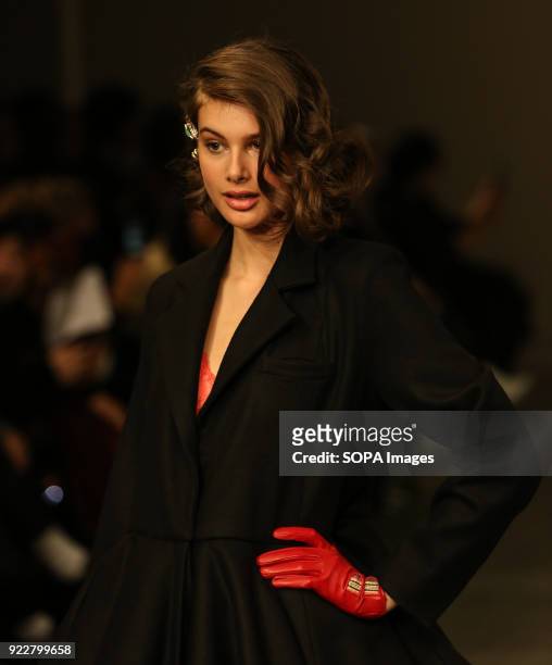 Model walks the runway at the Marta Jakubowski Show during London Fashion Week February 2018 at BFC Show Space.