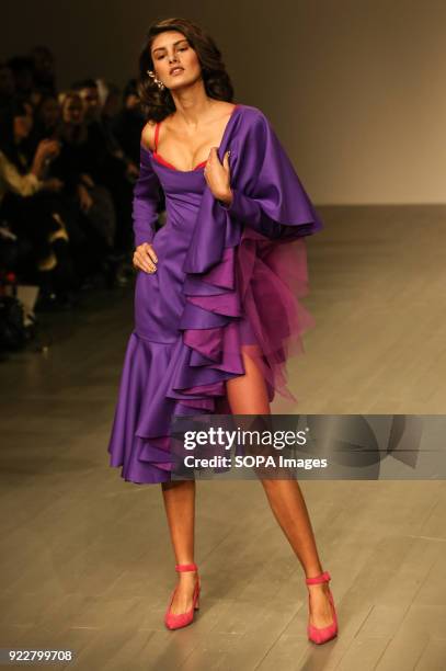 Model walks the runway at the Marta Jakubowski Show during London Fashion Week February 2018 at BFC Show Space.