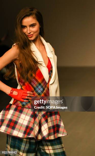 Model walks the runway at the Marta Jakubowski Show during London Fashion Week February 2018 at BFC Show Space.