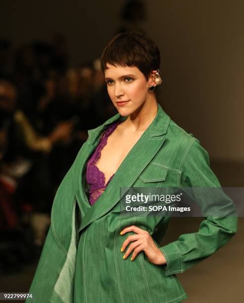 Model walks the runway at the Marta Jakubowski Show during London Fashion Week February 2018 at BFC Show Space.