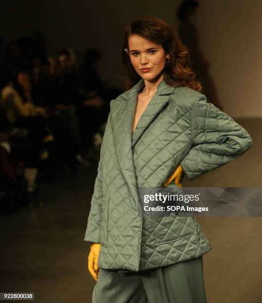 Model walks the runway at the Marta Jakubowski Show during London Fashion Week February 2018 at BFC Show Space.