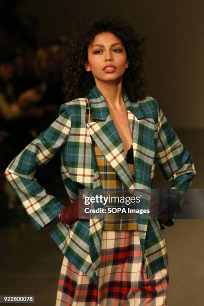 Model walks the runway at the Marta Jakubowski Show during London Fashion Week February 2018 at BFC Show Space.