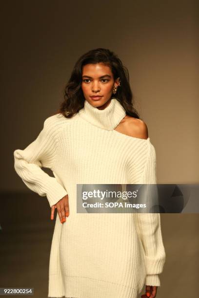 Model walks the runway at the Marta Jakubowski Show during London Fashion Week February 2018 at BFC Show Space.