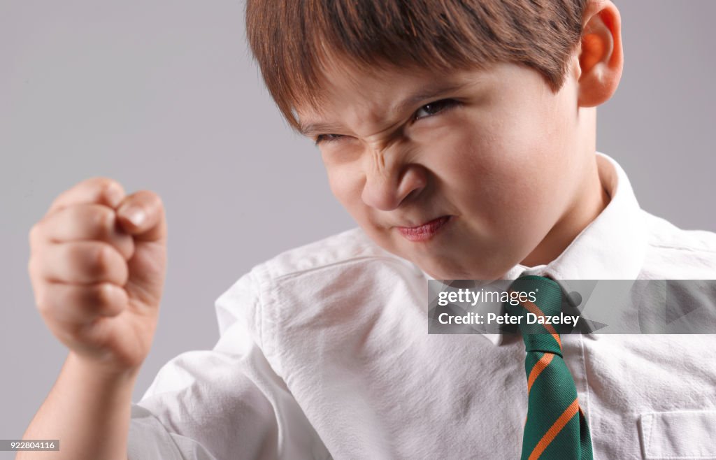 ANGRY SCHOOLBOY LASHING OUT