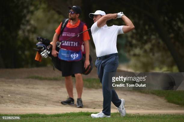 Jordan Smith of England hits an approach shot on the 1st hole during the first round of the Commercial Bank Qatar Masters at Doha Golf Club on...