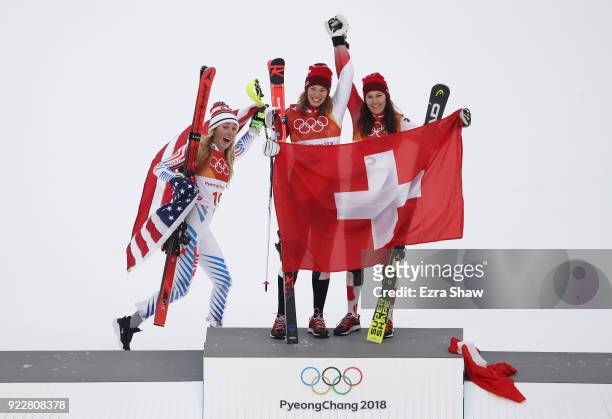 Silver medalist, Mikaela Shiffrin of the United States, gold medalist, Michelle Gisin of Switzerland and bronze medalist Wendy Holdener of...