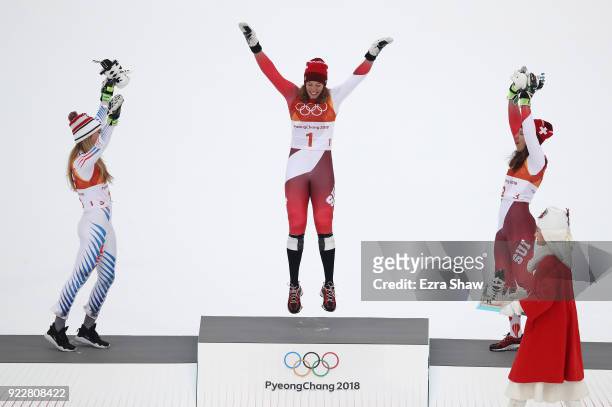Silver medalist, Mikaela Shiffrin of the United States, gold medalist, Michelle Gisin of Switzerland and bronze medalist Wendy Holdener of...