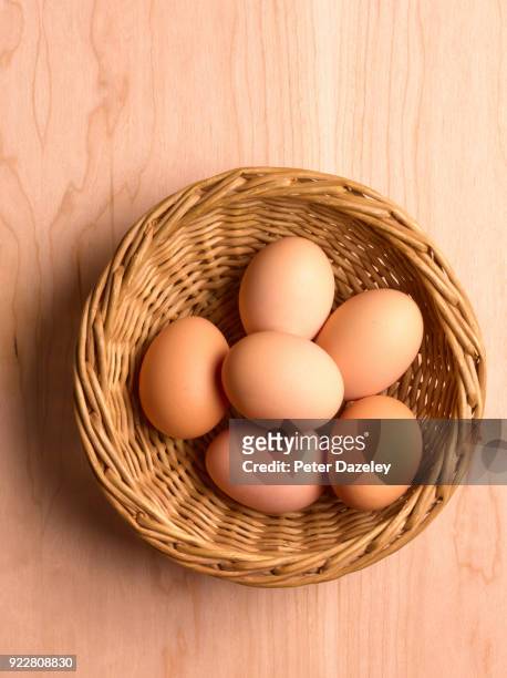 newly laid organic hens eggs - eggs basket stock pictures, royalty-free photos & images