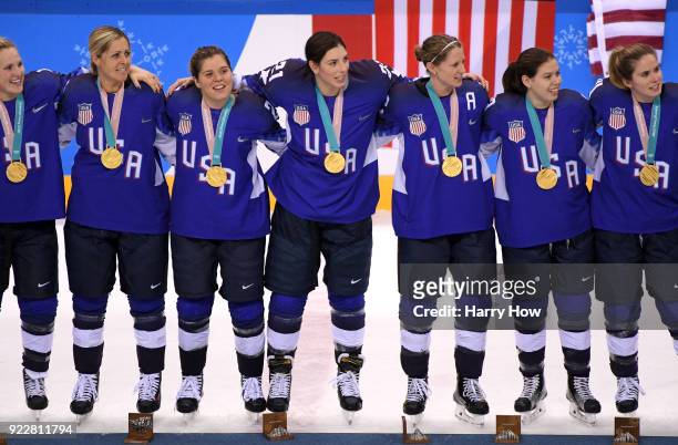 Gold medal winners the United States celebrate during the victory ceremony after defeating Canada in a shootout in the Women's Gold Medal Game on day...