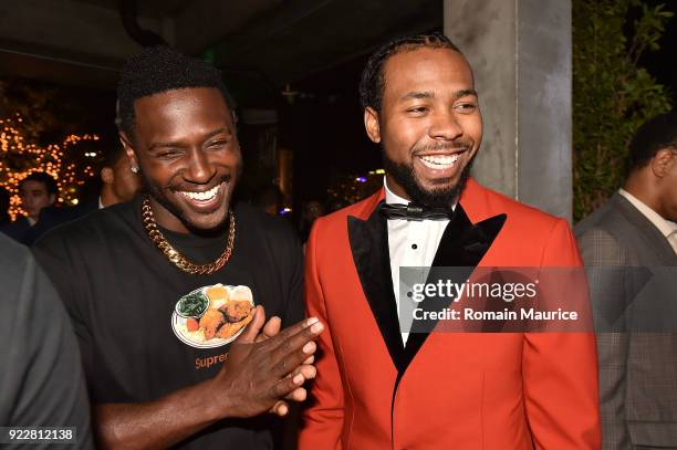 Antonio Brown, Josh Norman attend Haute Living and One Thousand Museum celebrate cover star Josh Norman at Kiki on the River on February 21, 2018 in...