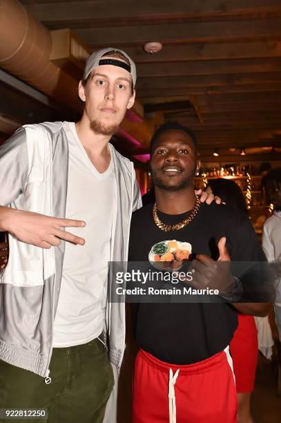 Kelly Olynyk and Antonio Brown attend Haute Living and One Thousand Museum celebrate cover star Josh Norman at Kiki on the River on February 21, 2018...