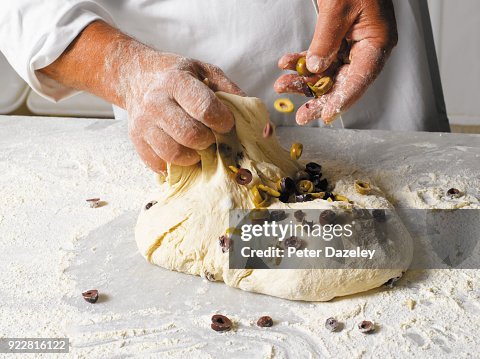 BAKER MAKING BREAD BAKER MAKING BREAD