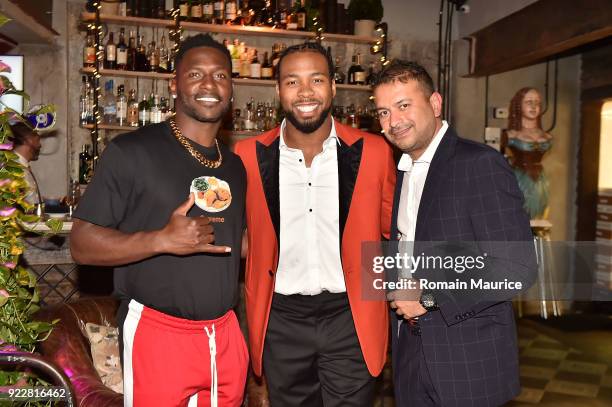 Antonio Brown, Josh Norman and Kamal Hotchandani attend Haute Living and One Thousand Museum celebrate cover star Josh Norman at Kiki on the River on...