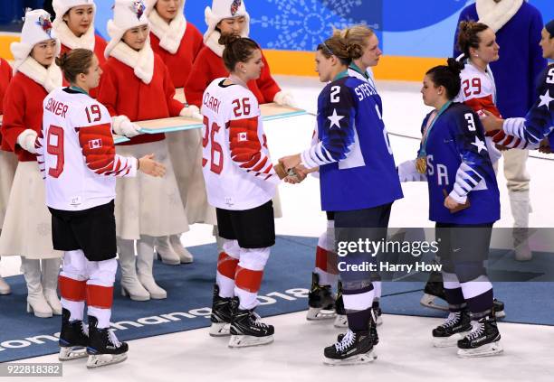 Emily Clark of Canada shakes hands with Lee Stecklein of the United States after the Women's Gold Medal Game on day thirteen of the PyeongChang 2018...