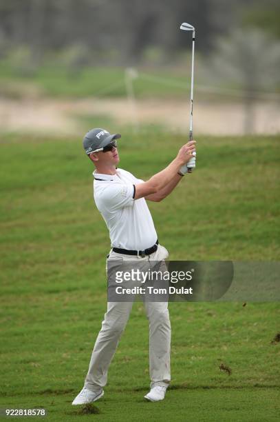 Brandon Stone of South Africa hits an approach shot on the 14th hole during the first round of the Commercial Bank Qatar Masters at Doha Golf Club on...