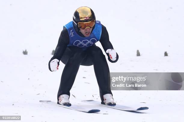 Wilhelm Denifl of Austria celebrates during the Nordic Combined Team Gundersen LH/4x5km, Ski Jumping Competition Round on day thirteen of the...