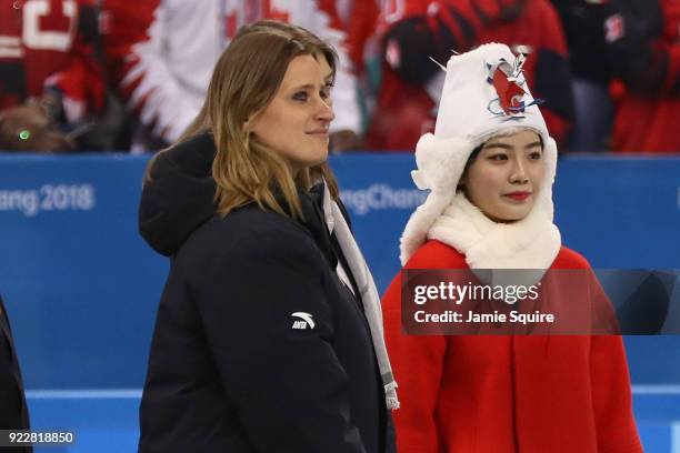 Member Angela Ruggiero looks on during the victory ceremony for the United States and Canada after the Women's Gold Medal Game on day thirteen of the...