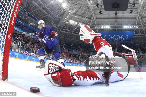 Jocelyne Lamoureux of the United States celebrates after she scores a goal against Shannon Szabados of Canada in a shootout to win the Women's Gold...