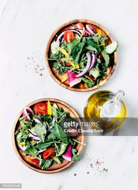 fresh arugula and baby kale salad - side salad stock pictures, royalty-free photos & images