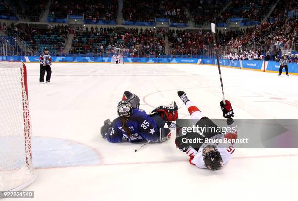 Melodie Daoust of Canada scores a goal against Madeline Rooney of the United States in the overtime penalty-shot shootout during the Women's Gold...