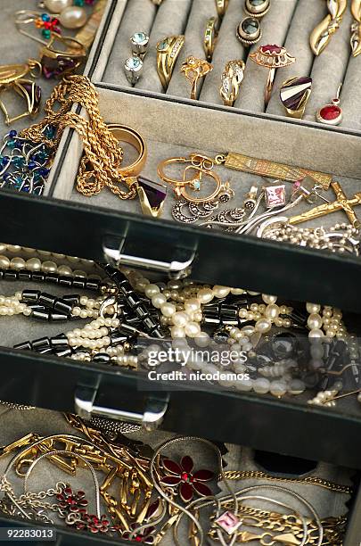 a jewelry box with gold, pearls and stone - earring box stock pictures, royalty-free photos & images