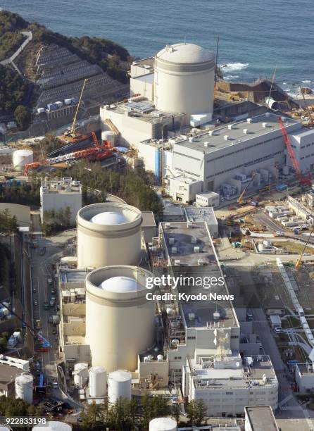 File photo taken on Jan. 19 shows the No. 1 , No. 2 and No. 3 reactors of the Mihama nuclear power plant in Fukui Prefecture, Japan, operated by...