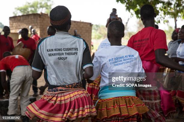 Beneficiaries of the ICC's Trust Fund for Victims dance in Awach during a monitoring visit by senior officials from The Hague.