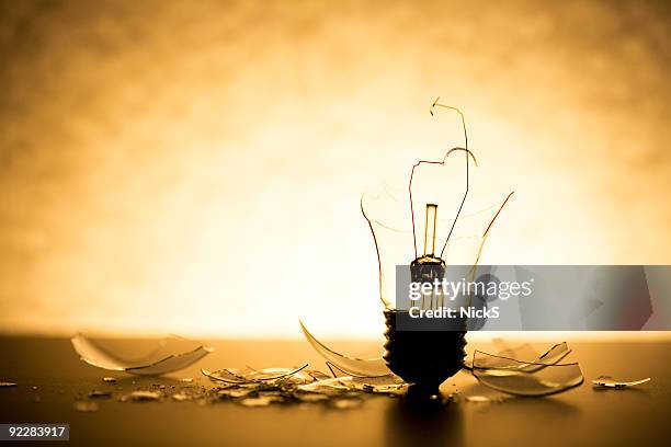 broken lightbulb - broken lamp stock pictures, royalty-free photos & images