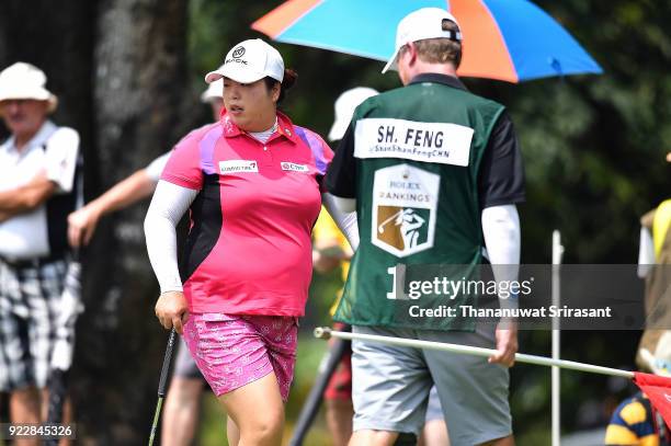 Shanshan Feng of China and her caddy looks on green during the Honda LPGA Thailand at Siam Country Club on February 22, 2018 in Chonburi, Thailand.