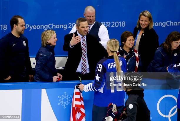 Head coach of USA Robb Stauber greets Gigi Marvin of USA while celebrating the goal medal following the Women's Ice Hockey Gold Medal game final...