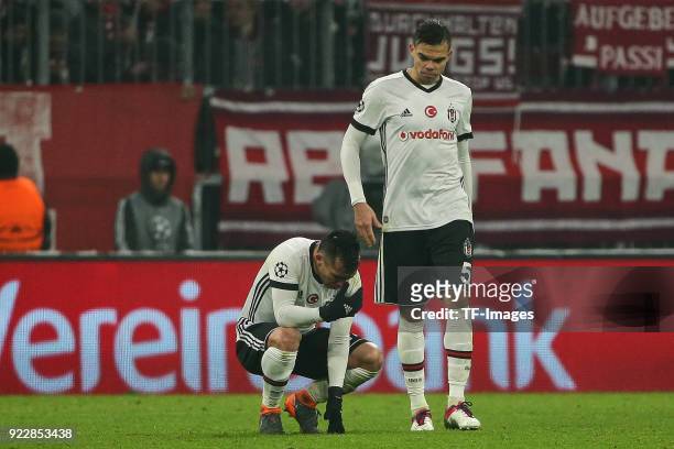 Gary Medel of Besiktas Istanbul and Pepe of Besiktas Istanbul looks dejected during the UEFA Champions League Round of 16 First Leg match between...