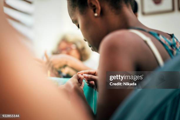 brazilian women working in tailor workshop - sewing stock pictures, royalty-free photos & images