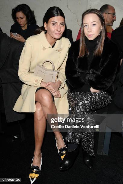 Giovanna Battaglia and a guest attend the Max Mara show during Milan Fashion Week Fall/Winter 2018/19 on February 22, 2018 in Milan, Italy.