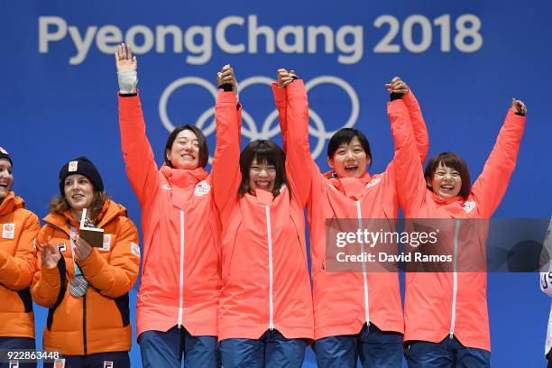 Gold medalists Miho Takagi, Ayaka Kikuchi, Ayano Sato and Nana Takagi of Japan celebrate during the medal ceremony for Speed Skating - Ladies' Team...