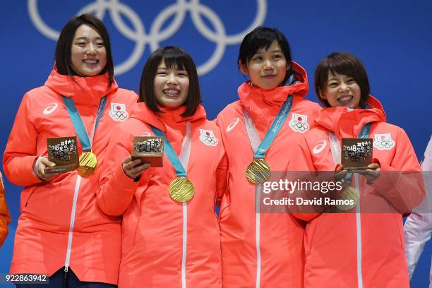 Gold medalists Miho Takagi, Ayaka Kikuchi, Ayano Sato and Nana Takagi of Japan celebrate during the medal ceremony for Speed Skating - Ladies' Team...