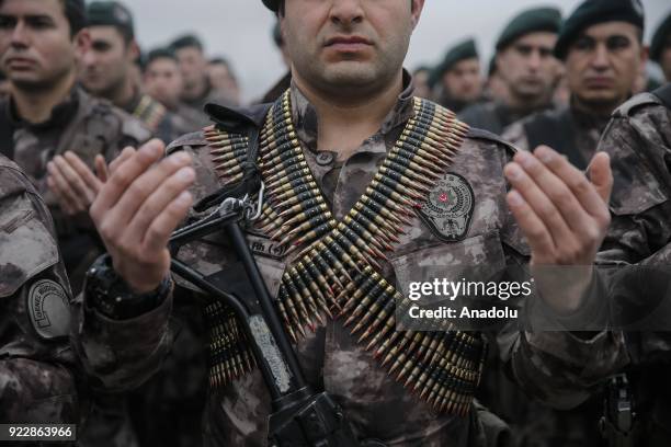 Police Special Operation members pray during their sendoff ceremony in Ankara, Turkey on February 22, 2018. Seven crews of a hundred and fifty...