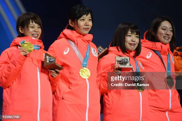 Gold medalists Miho Takagi, Ayaka Kikuchi, Ayano Sato and Nana Takagi of Japan celebrate during the medal ceremony for Speed Skating - Ladies' Team...