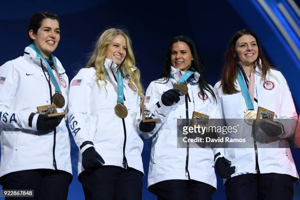 Bronze medalists Heather Bergsma, Brittany Bowe, Mia Manganello and Carlijn Schoutens of the United States celebrate during the medal ceremony for...