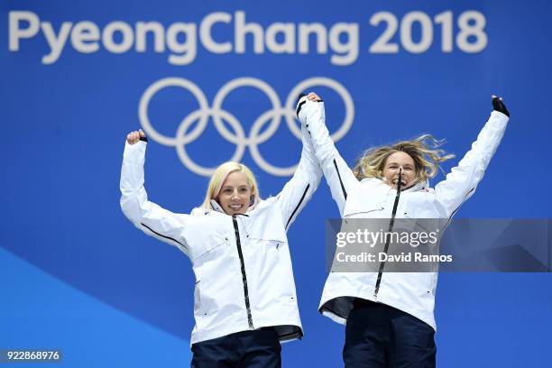 Gold medalists Kikkan Randall and Jessica Diggins of the United States celebrate during the medal ceremony for Cross-Country Skiing - Ladies' Team...