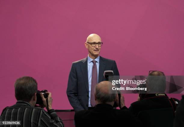 Tim Hoettges, chief executive officer of Deutsche Telekom AG, poses for photographers as he arrives for a full year earnings news conference at the...