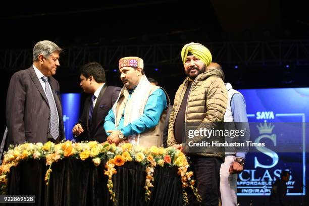 Mishra, Upendra Tiwari and singer Daler Mehndi during Alavish, star-studded event hosted by real estate company Saya Homes, as they announced the...