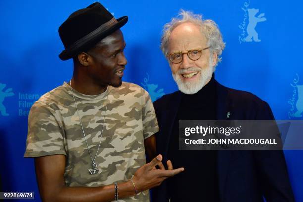 Actor Akhet Tewende and Swiss director, screenwriter and producer Markus Imhoof pose during the photo call for the documentary "Eldorado" presented...