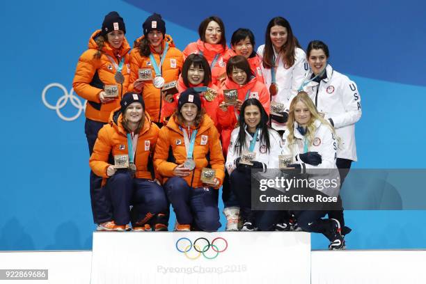 Silver medalists Marrit Leenstra, Lotte Van Beek, Ireen Wust and Antoinette De Jong of the Netherlands, gold medalists Miho Takagi, Ayaka Kikuchi,...