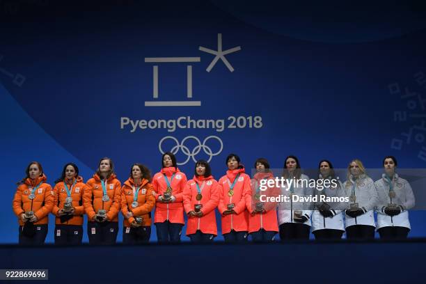 Silver medalists Marrit Leenstra, Lotte Van Beek, Ireen Wust and Antoinette De Jong of the Netherlands, gold medalists Miho Takagi, Ayaka Kikuchi,...