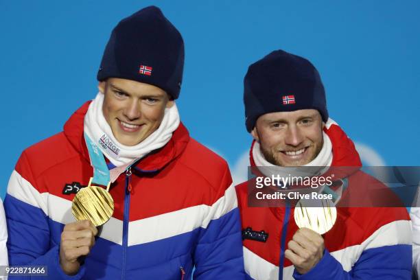 Gold medalists Martin Johnsrud Sundby and Johannes Hoesflot Klaebo of Norway celebrate during the medal ceremony for Cross-Country Skiing - Men's...