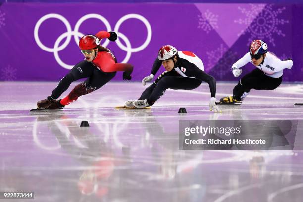 Samuel Girard of Canada, Ryosuke Sakazume of Japan and Yira Seo of Korea skate during their Men's 500m Short Track Speed Skating Quarter Final on day...